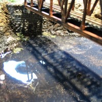 STARTING TO POUR THE HARBOUR WITH WOODLAND SCENICS REALISTIC WATER.