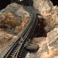 FINISHED TRESTLE CONNECTS MILE 20 AREA AT END OF LAYOUT WITH THE YARD AREA IN THE MIDDLE OF THE LAYOUT.