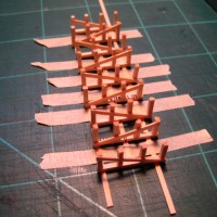 MAINTENANCE PLATFORM SUPPORTS LINED UP AND GLUED ON TOP PLANKING.