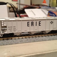 An Athearn Erie PS covered hopper.