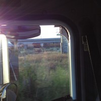 On a trip to Oakland, I found a BNSF stack train with a KCS loco in the consist, if you can see it!