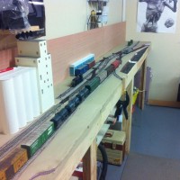 Progress is being made. I finished the HARSCO parts warehouse and we have doors to unload box cares. I mounted the back board for 12 feet of the layout.
