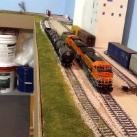 Looking east towards the BNSF interchange staging track. The far end will be the lumber industry. I have gotten moving on ground cover and am also adding static grass.