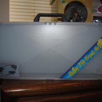 I recently bought a portable spray booth online for about $90. It folds up to the size of a small suitcase.