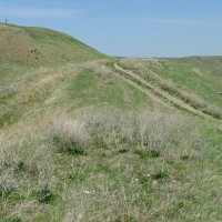 The road takes a sharp nosedive towards Red Coulee...
