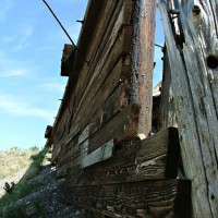 well-creosoted timbers in a retaining wall