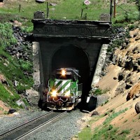 BNSF 7009 bursts into sunshine at Mullan Tunnel WP