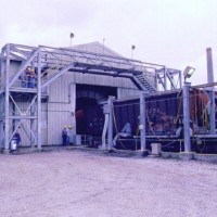Rotary dumper building