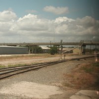 End of yard Behind Overpass