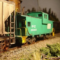 Penn Central Passing PC caboose 26403
