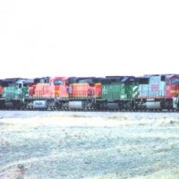 7 unitrs haul the DENLAU out of Cheyenne in fading light