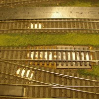 Moving an uncoupling magnet under the track