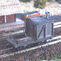 CAST METAL LOGGING CABOOSE FROM RLW