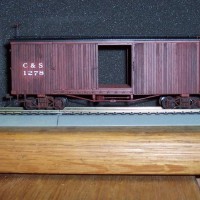 Shots of lowered, weathered, and backdated Bachmann C & S Boxcars