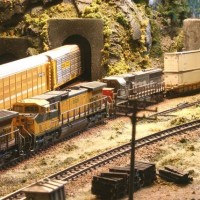 UP Stack train exits the tunnel under "Big Curve" on the BSNF Ell