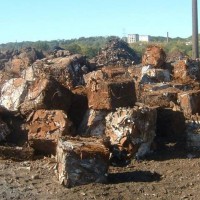 Keystone bundled scrap in piles, Allied Mills in background