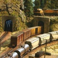 String of Hoppers below the big curve BNSF Ella Tayor Sub