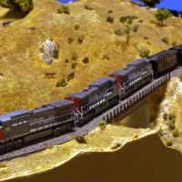 SP232 (AC4400) leads EB loaded coal over Tehachapi Creek