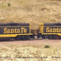 Santa Fe GP7s  on a siding.