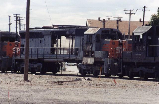 A closer look at an SD45 in storage behind SP's backshop area. She looks like she has a bent frame.
