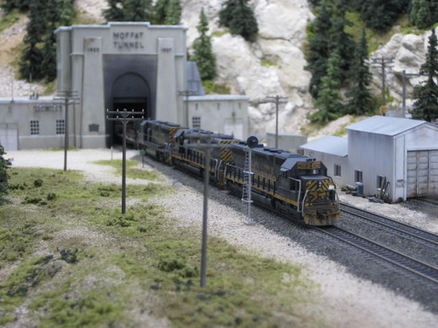 A pair of SD45's + a single geep head out of East Portal