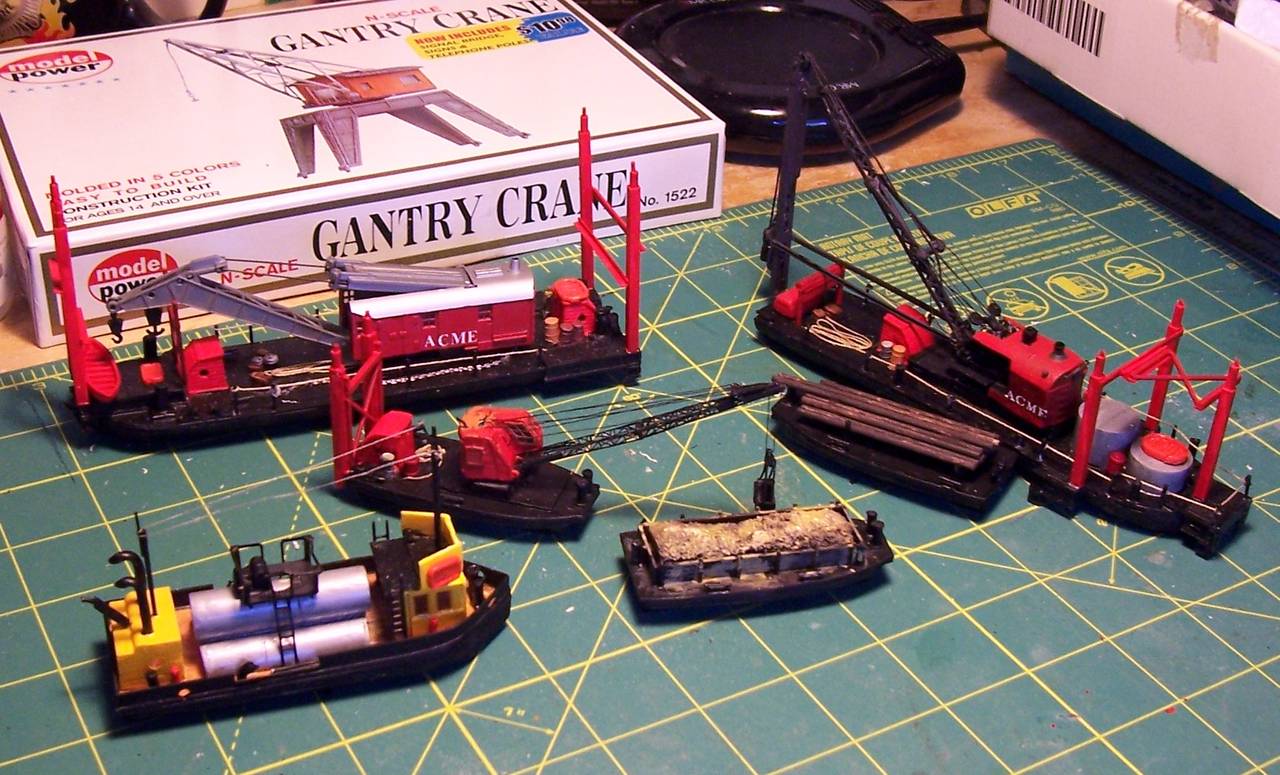 Fuel lighter, dredge and two barges.