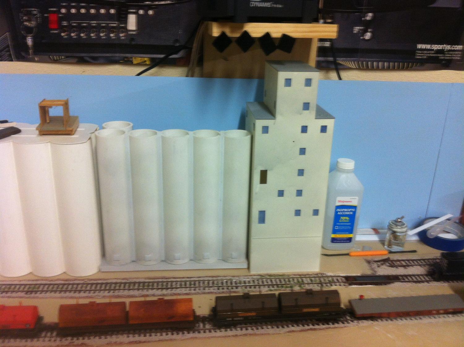 Kit bashing the Walthers Grain Elevator, I am using PVC pipe for the barrels. I plan to extend the capacity of the structure and add some metal silos as well.